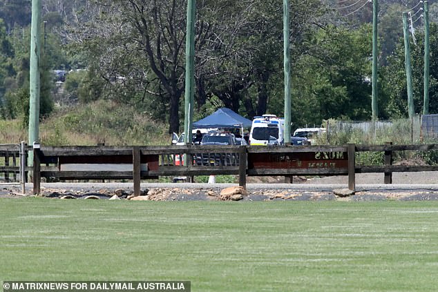 A tent covered the grassy area where the shocking discovery was made while forensic police scoured the area
