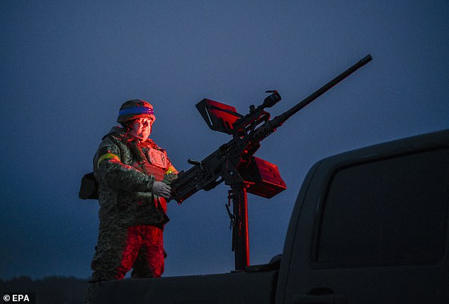 A Ukrainian serviceman from an anti-drone mobile fire team prepares to intercept Russian drones at an undisclosed location in the Chernihiv region, northern Ukraine, on February 14 2026