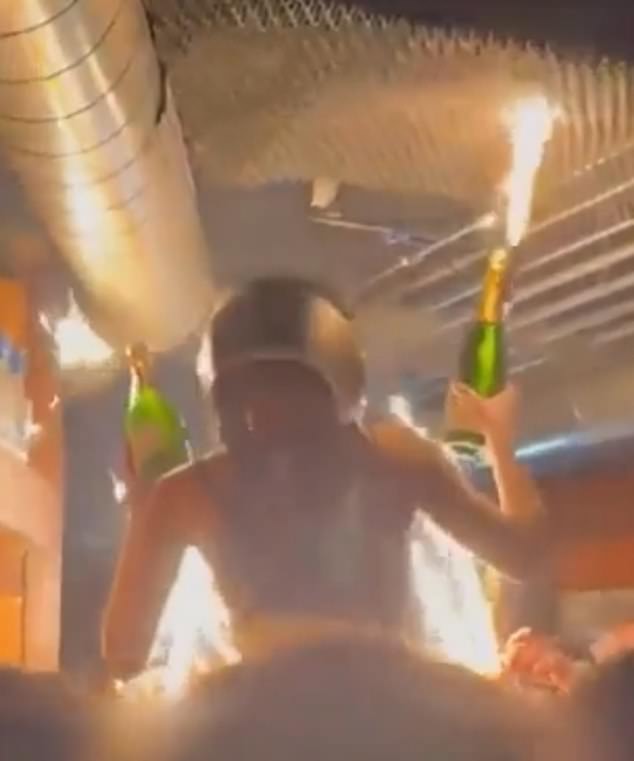 New footage of Swiss nightclub inferno shows ceiling insulation INSTANTLY caught fire when sparklers were raised to it - and first clue as to why youngsters did not immediately flee