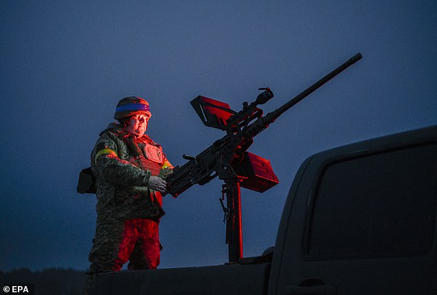 A Ukrainian serviceman from an anti-drone mobile fire team prepares to intercept Russian drones at an undisclosed location in the Chernihiv region, northern Ukraine, on February 14 2026