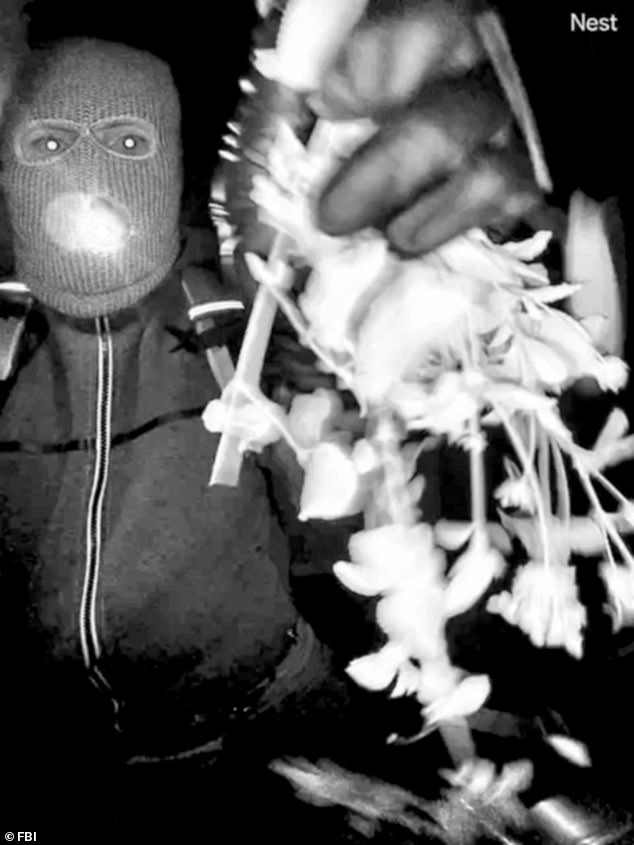 The unidentified suspect was later seen trying to obscure the Nest doorbell camera