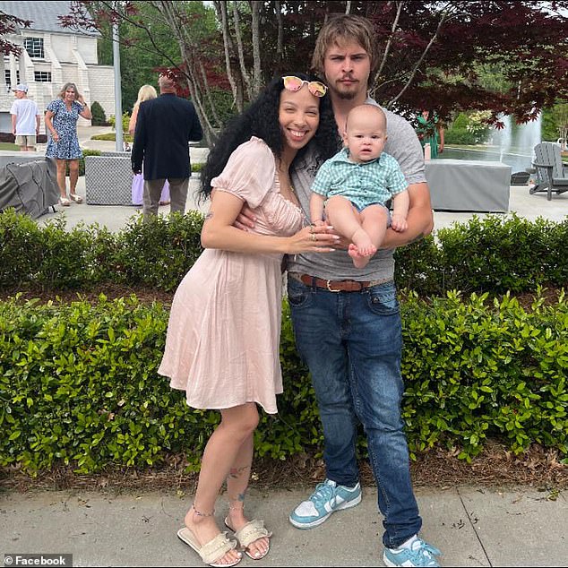 Parker with his girlfriend and their one-year-old