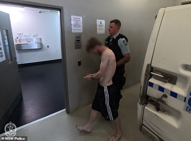 The second man arrested in Castle Hill was taken to the police station shirtless and barefoot
