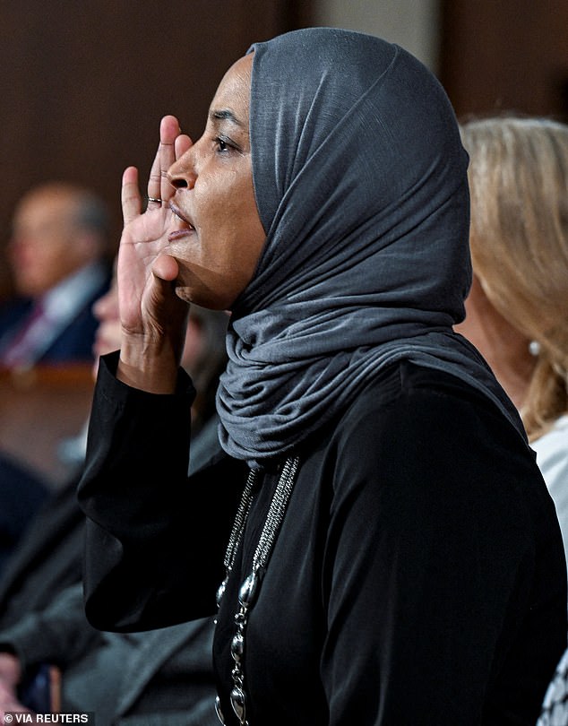 Democratic Representative Ilhan Omar of Minnesota can be seen yelling up at the rostrum at President Donald Trump during Tuesday night's State of the Union address