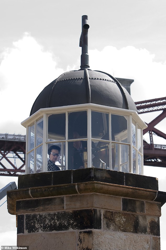 The Princess pictured at what is thought to be the world's smallest light in North Queensferry