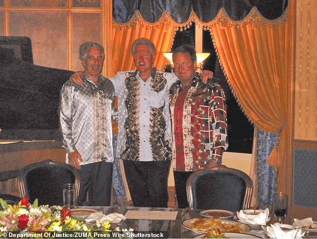 Epstein, Bill Clinton and an unidentified man in a photo from the Epstein files