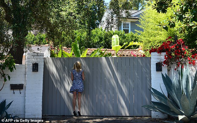 The house cannot be seen from the street, which does not stop curious visitors from attempting to peer over the fence or gain access to other nearby properties in order to get a peak