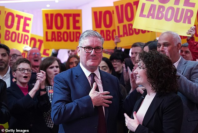The keenly contested by-election will prove a crucial test for Prime Minister Sir Keir Starmer, whose premiership has been rocked by challenges from the start. Pictured: The PM on his visit to Gorton and Denton earlier this week, with Labour candidate, Ms Stogia, right