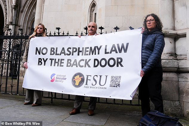 Mr Coskun (centre) with supporters at the Royal Courts Of Justice. He was supported by the National Secular Society and the Free Speech Union