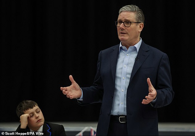 Sir Keir Starmer, pictured speaking to students in Newcastle earlier on Thursday, is facing an anxious wait for the result