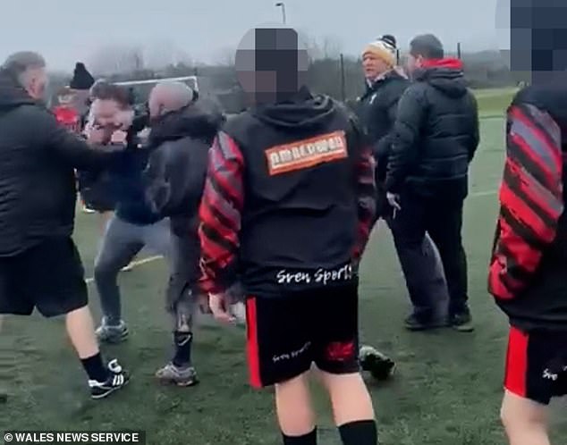 Those trying to stop the fighting ended up getting embroiled in the maul with punches flying everywhere