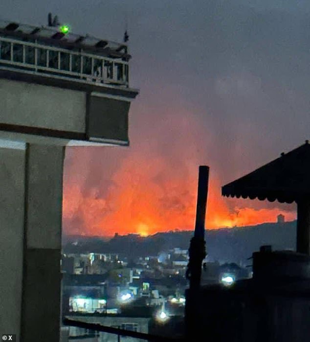 Pakistan defence minister declares 'open war' with Afghanistan after explosions heard in Kabul in latest escalation of violence