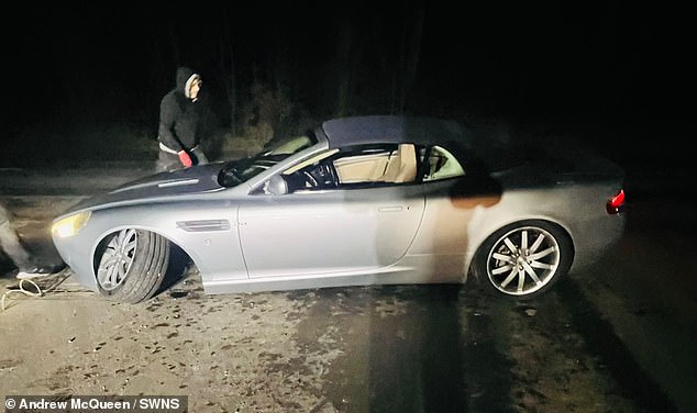 Father and daughter, 10, are 'lucky to be alive' after huge pothole wrote off his £40,000 Aston Martin