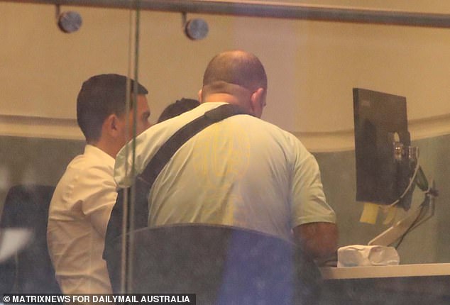 The Bondi hero took his gold bars to the ANZ Bank in Martin Place where he met with a female employee and signed paperwork while the gold rested on a desk