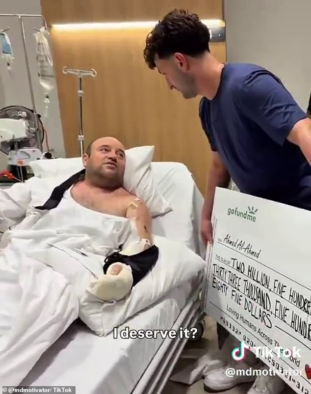 Ahmed al-Ahmed in post-surgery recovery at St George Hospital after being shot in the shoulder was personally delivered a huge GoFundMe cheque