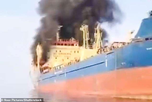 Oil tanker bursts into flames after being hit by Iranian drones in Strait of Hormuz as markets brace for price surge in aftermath of attacks