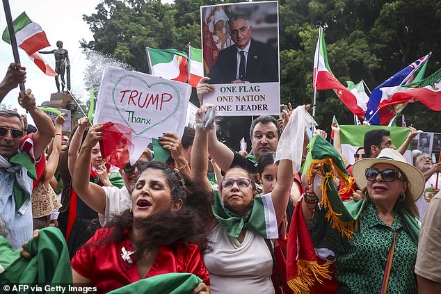 Hyde Park was filled with Iranian flags as people celebrated the downfall of the Ayatollah