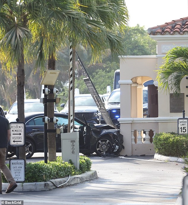 One vehicle appeared to have struck and damaged the black metal security gates at the entrance