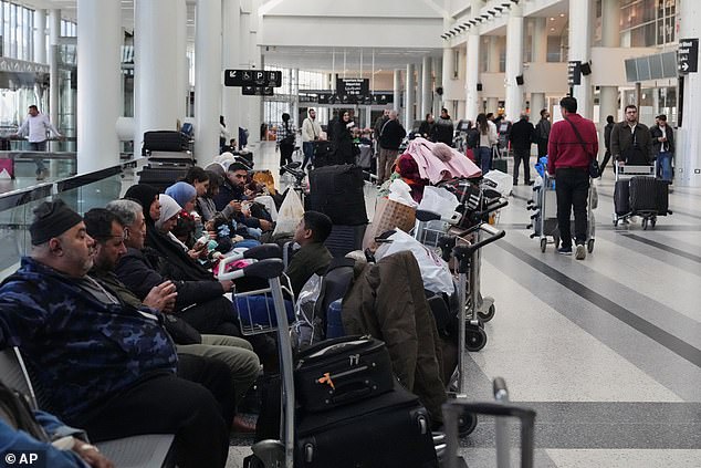Many major airlines have similarly cancelled or diverted flights to and from the Middle East amid safety concerns. Pictured: Passengers stranded at Rafik Hariri International Airpotr in Beirut, Lebanon, on Saturday after the US and Israel's air strikes on Iran