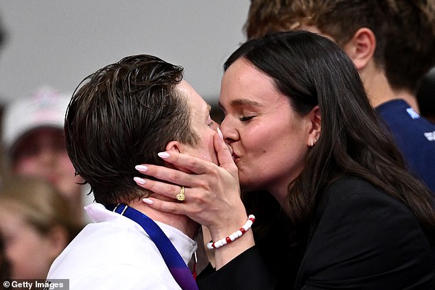 Adam Ramsay-Peaty with wife Holly after medal win
