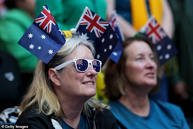 Fans of Team Australia show their support at the netball