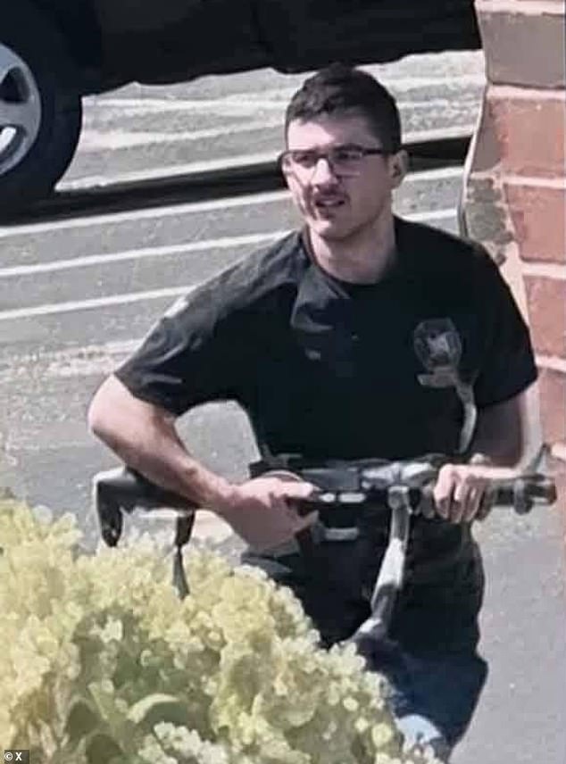 Images circulating across social media appeared to show a gunman armed with a camouflaged AR-style assault rifle, wearing glasses, blue jeans, and a black T-shirt with a logo on the chest