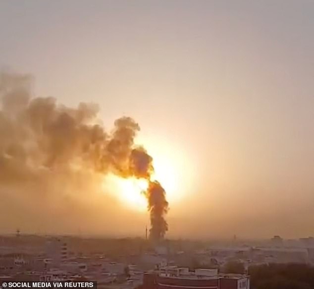 Smoke is seen here rising following multiple US strikes hit the city of Ahvaz in the Khuzestan Province in Iran on Thursday