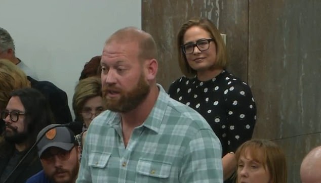 Former senator Kyrsten Sinema watches Matthew Ammel, her former bodyguard, with whom she had an affair, testify before the Arizona legislature in February 2024. They first became intimate in May of that year