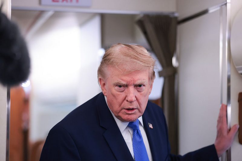 U.S. President Donald Trump speaks to reporters aboard Air Force One on August 02, 2026 on a return flight to Joint Base Andrews, Maryland. (Photo by Anna Moneymaker/Getty Images)