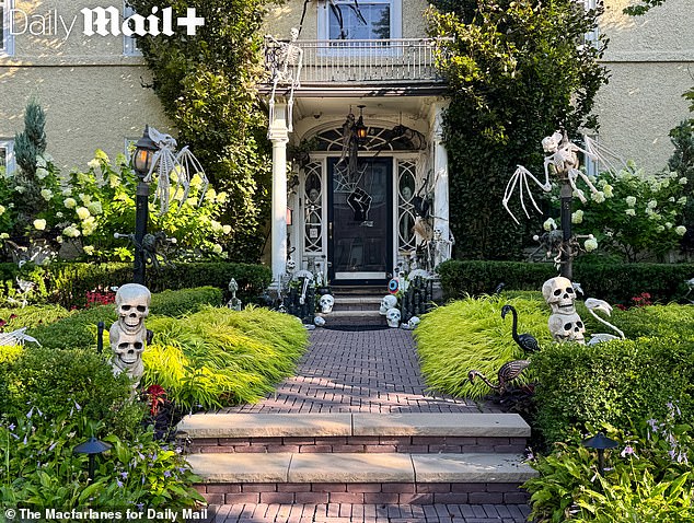 The beautifully-tended gardens are filled with plastic skulls and skeletons
