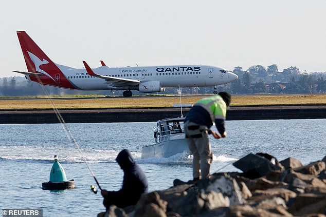 Qantas saved about $125million in the year after outsourcing hundreds of jobs