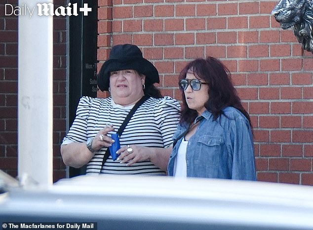 When approached by the Daily Mail, Meg, who is famously shy, was extremely friendly and laughed out loud as she denied being the famous rocker - before giving the game away
