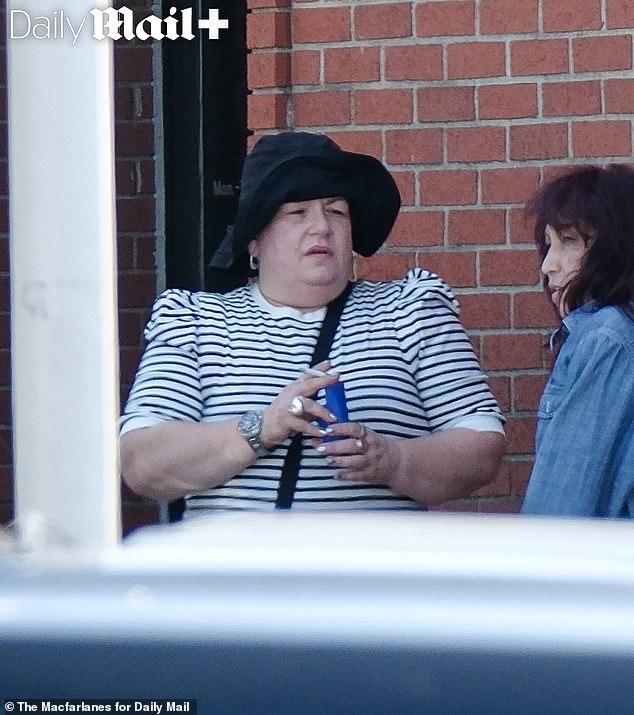 Meg White was seen enjoying a cigarette with two female friends in Detroit on Wednesday afternoon
