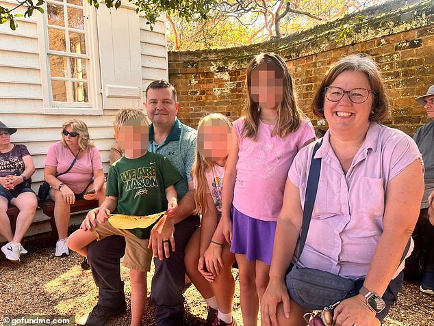Payne was struck by a stolen Kia driven by a 13-year-old with six other teenagers inside, police said. The father is pictured with three of his children and his wife, Lisa