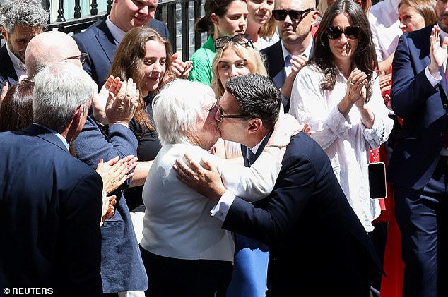 The former Greater Manchester mayor saved a kiss for his mother, Eileen, who was there to see him speak