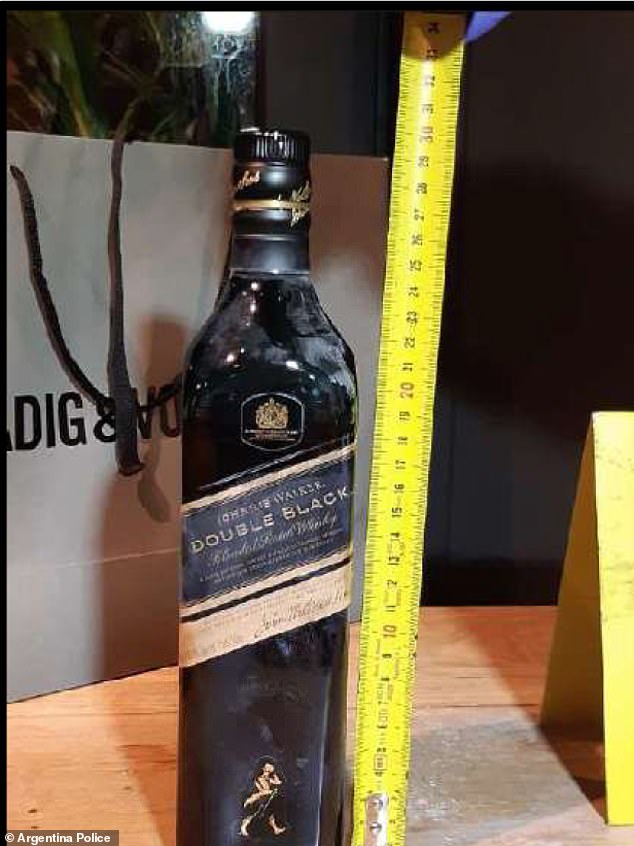 A bottle of Johnnie Walker Double Black whisky was also found in his room