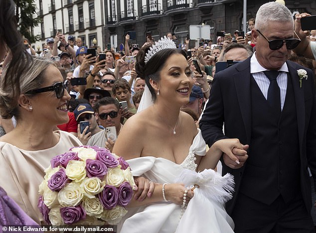 Ronald-NO! Thousands of CR7 fans mob bemused wedding couple wrongly believing they are the famous footballer and his fiancee Georgina Rodriguez