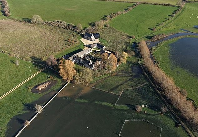 Plans for the new stables have been knocked back by West Oxfordshire District Council (Pictured: the couple's £15million property)