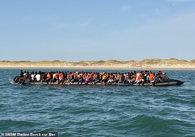 Small boat record smashed again as 230 migrants smuggled into Britain on 'mega dinghy' - despite Labour claims its 'smash the gangs' policy is working