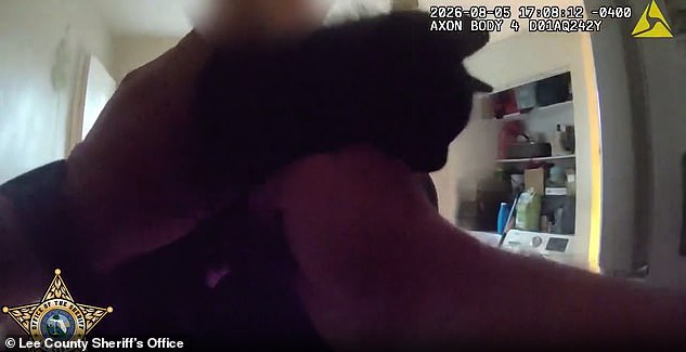 Bodycam footage from responding officers saw a dark-colored young kitten being placed into a cat carrier and removed from the property