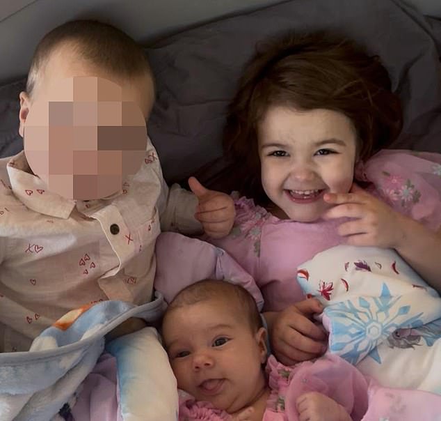 Her daughters Morgan, three, and Ava, five months, were killed in the attack. Erhart's one-year-old son survived, but sustained serious injuries