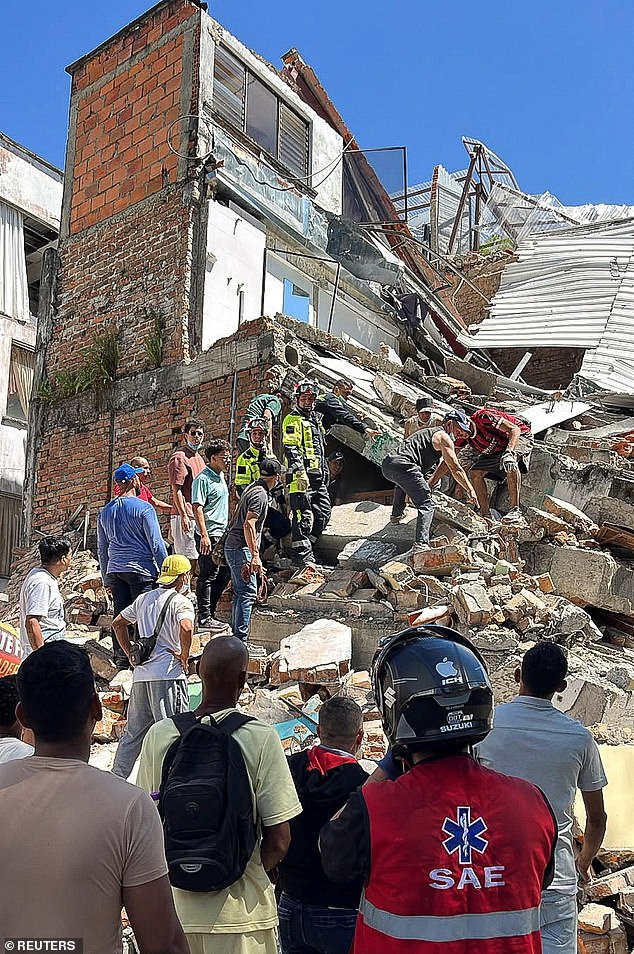 Residents and emergency workers dug through the rubble in Pereira, around 100 miles from Cali