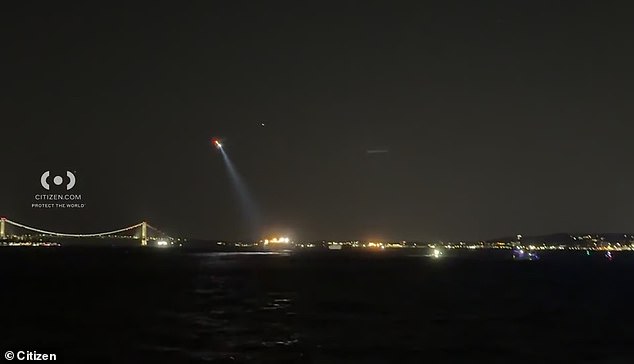 Hernandez's state-level criminal charges are no longer being pursued as the federal investigation unfolds. Above, a helicopter searching the water after the boat capsized
