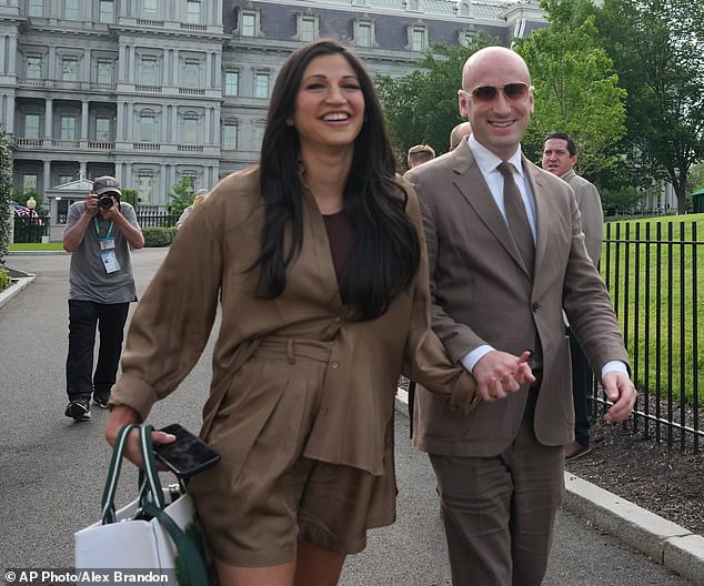 Miller's decision to show her public sign of support of AOC comes as the woke congresswoman actively calls for her husband to resign and labeled him a 'white nationalist.' The Millers are pictured arriving at UFC Freedom 250 event at the White House