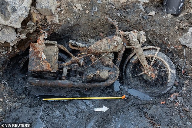 A German military motorcycle from the Second World War found on the banks of the river in Budapest, opposite the Hungarian Parliament building