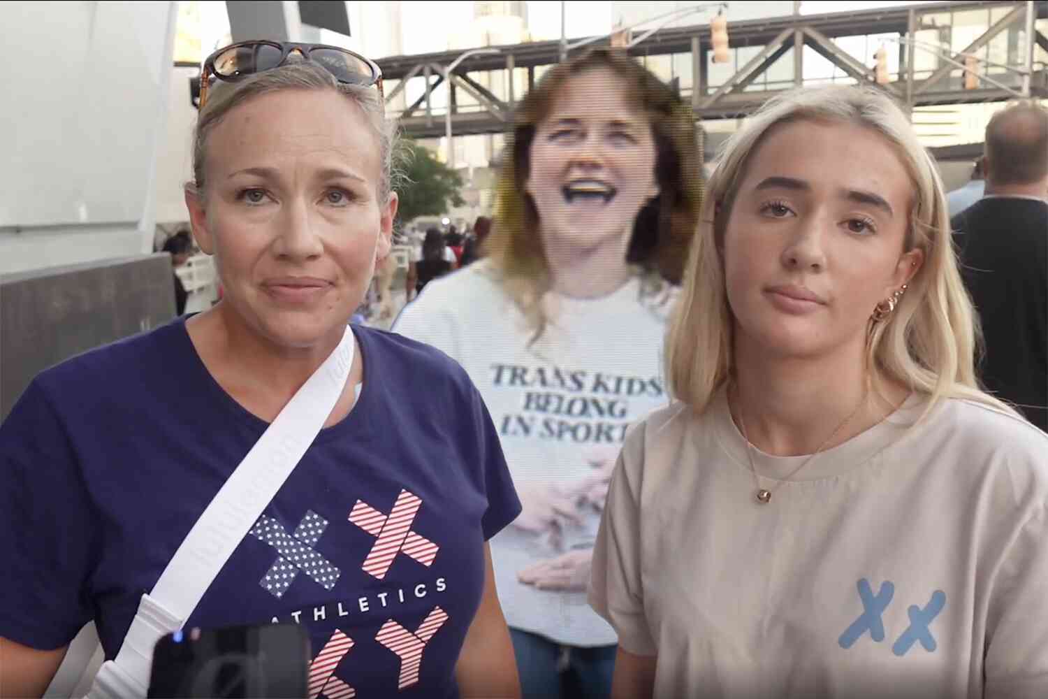 Thumbnail for Mom and daughter prohibited from wearing "XX-XY" shirts into WNBA game that featured "trans kids" shirt on Jumbotron