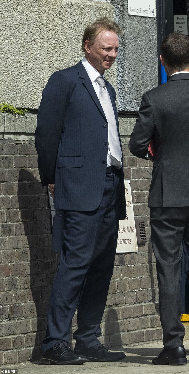 Hensher, wearing a suit and silver tie for his court appearance, is a father of three