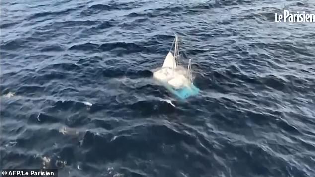 Moment Brit tourists spot deserted sinking yacht off French coast during ferry trip from the UK sparking hunt for missing sailors