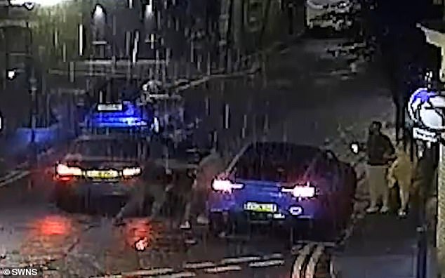 Five minutes after the first robbery, thugs sprang out of a second BMW and launched an assault on pedestrians on the street over, demanding their watches with zombie knives