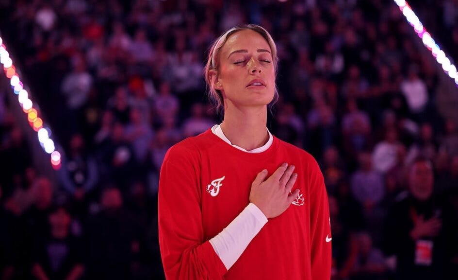 Sophie Cunningham #8 of the Indiana Fever stands for the national anthem before their game against the Golden State Valkyries at Chase Center on May 28, 2026 in San Francisco, California.